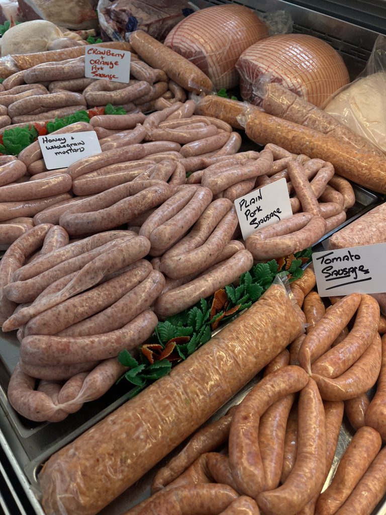 Plates of sausages in JP Meats