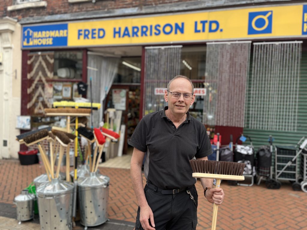 Staff member outside Fred Harrison's in Worksop